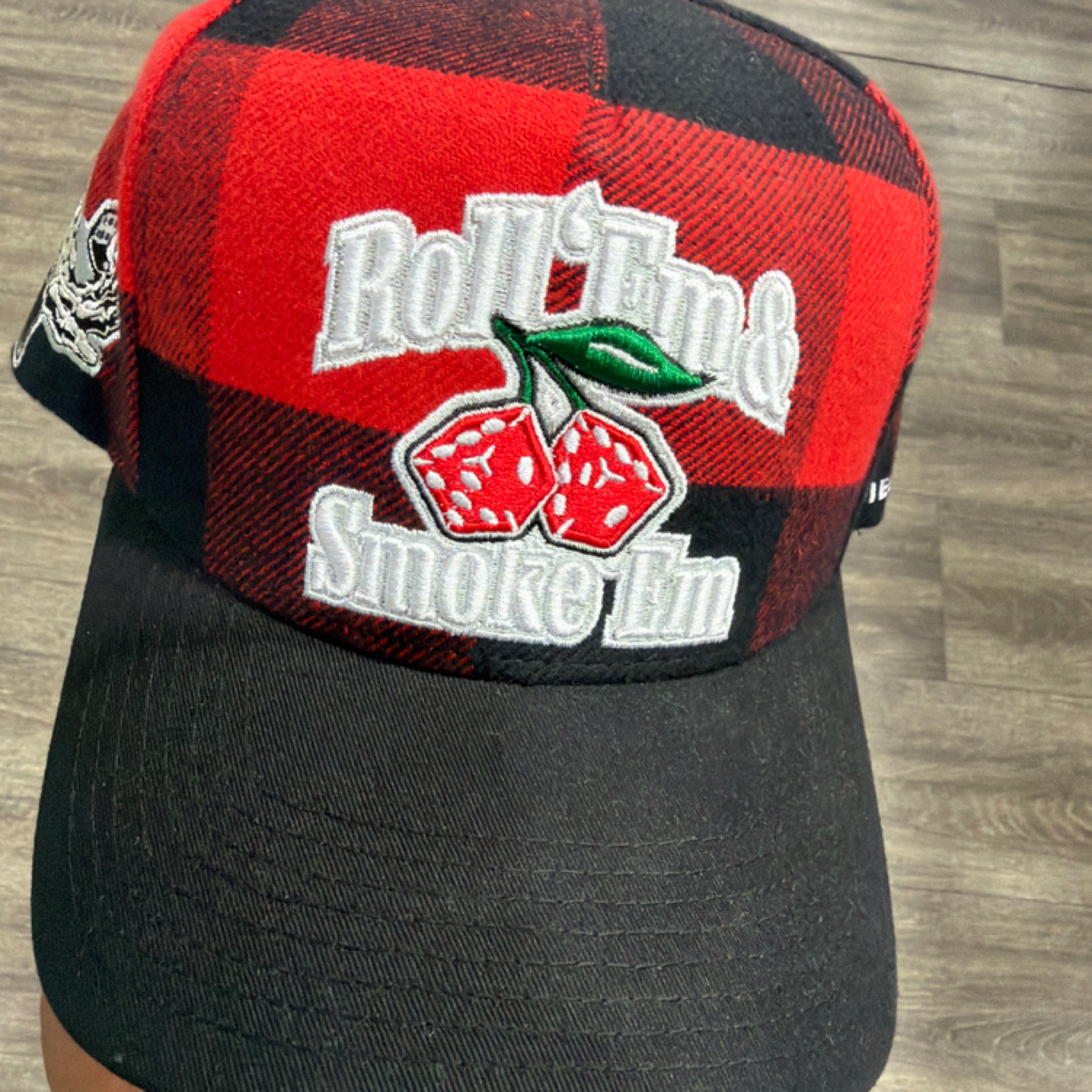 roll em buffalo plaid black trucker